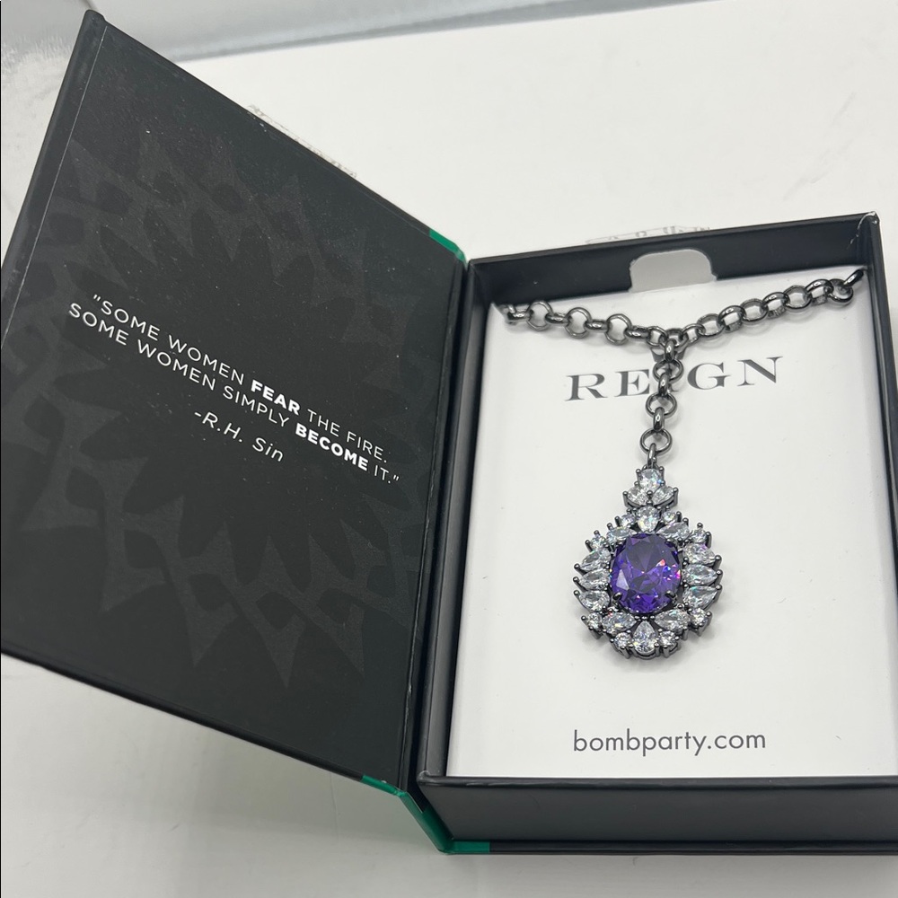 Reign main stone dark violet cubic zirconia w hematite plating. 18” Necklace